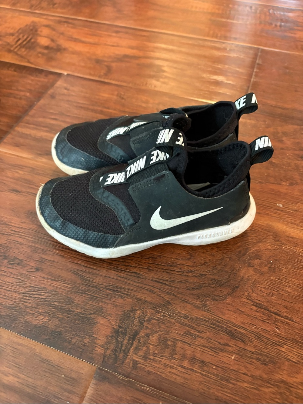 Nike Kids Black and White Slip-On Sneakers